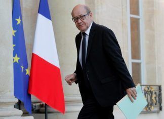 French Defence Minister Jean-Yves Le Drian arrives to attend a defence council at the Elysee Palace in Paris