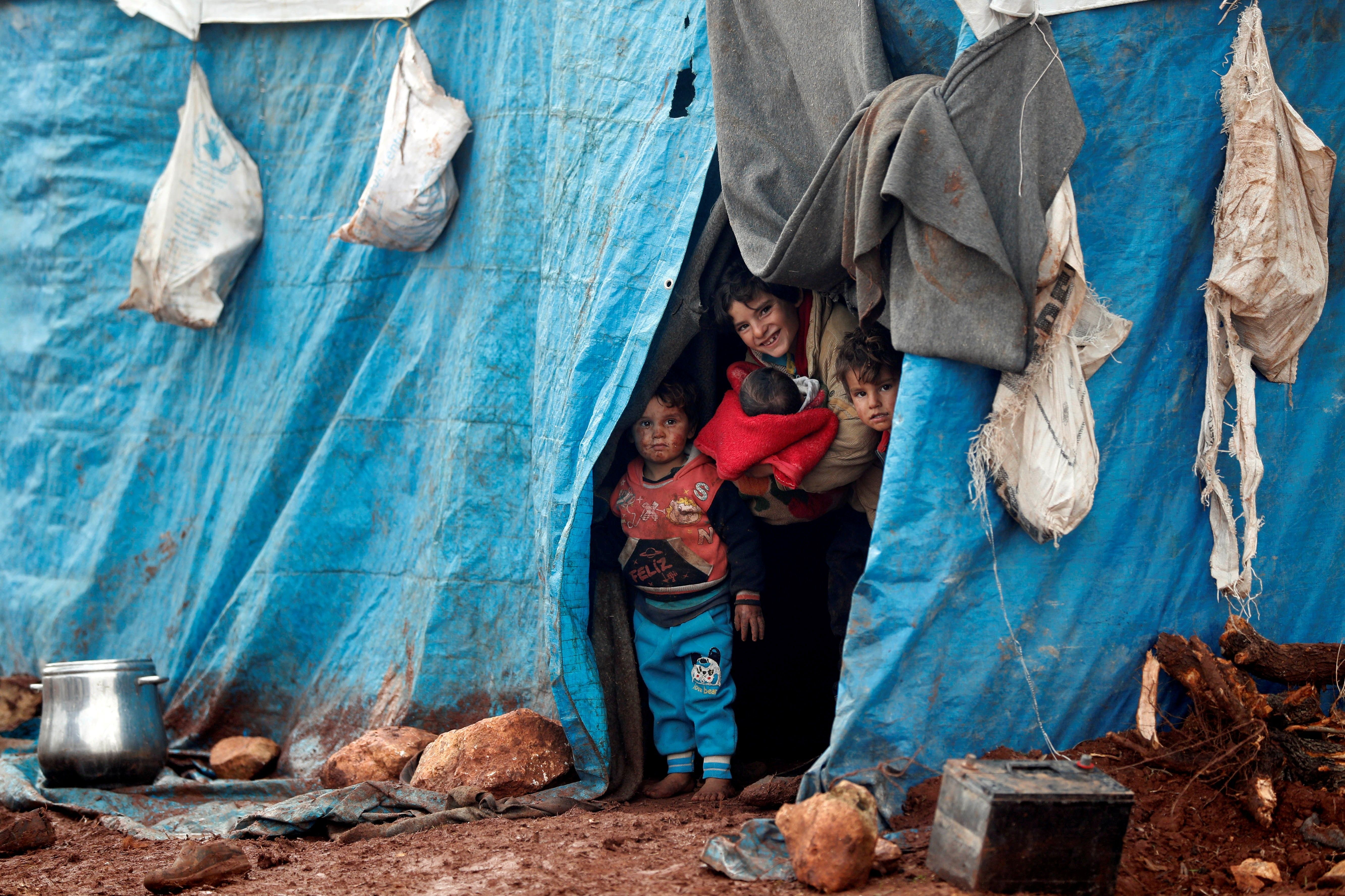 2018-01-18T134739Z_1082458693_RC11CEC281F0_RTRMADP_3_MIDEAST-CRISIS-SYRIA-CAMP