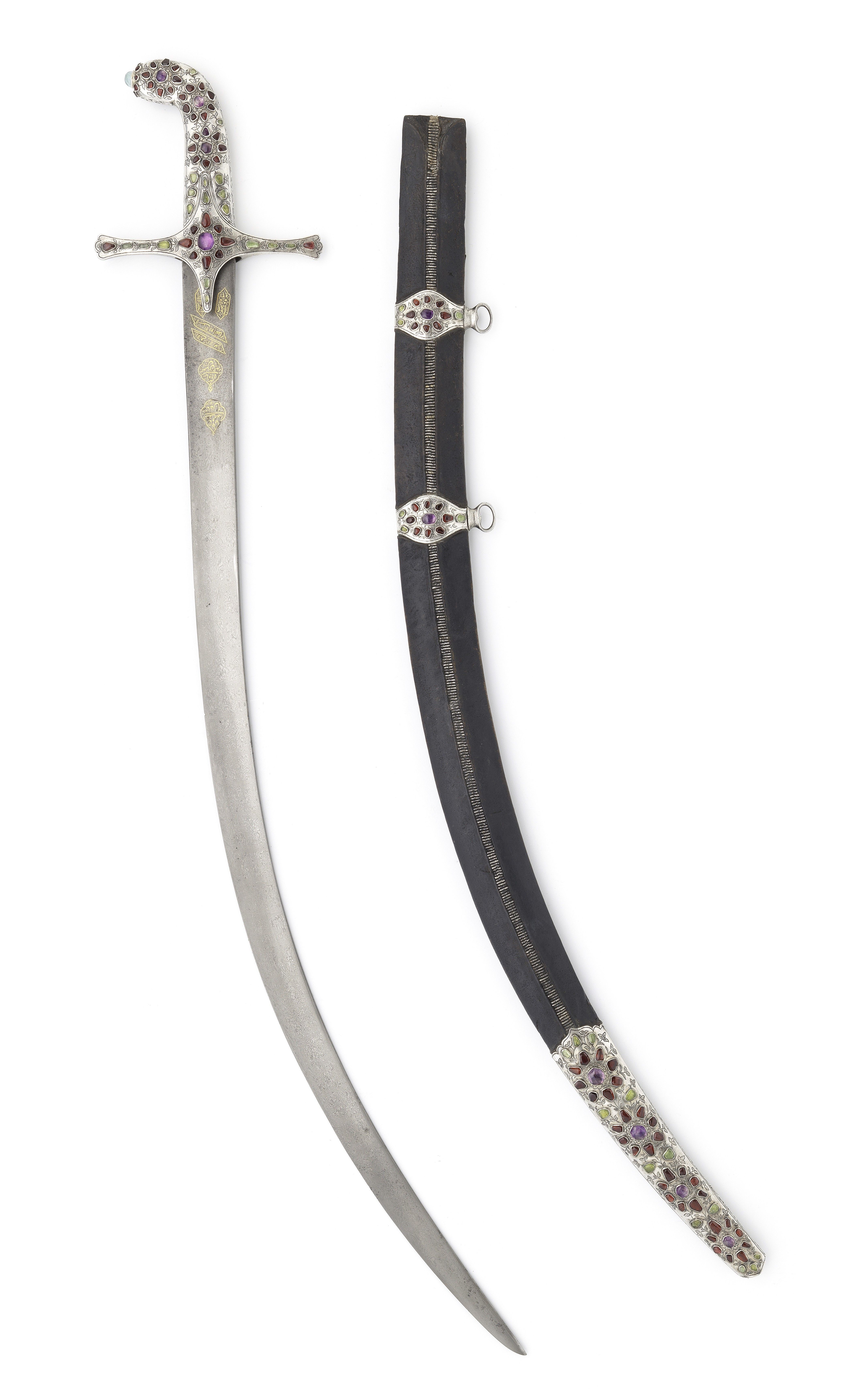 A-fine-gold-damascened-watered-steel-sword-shamshir-bearing-the-name-of-Fath-Ali-Shah-Qajar