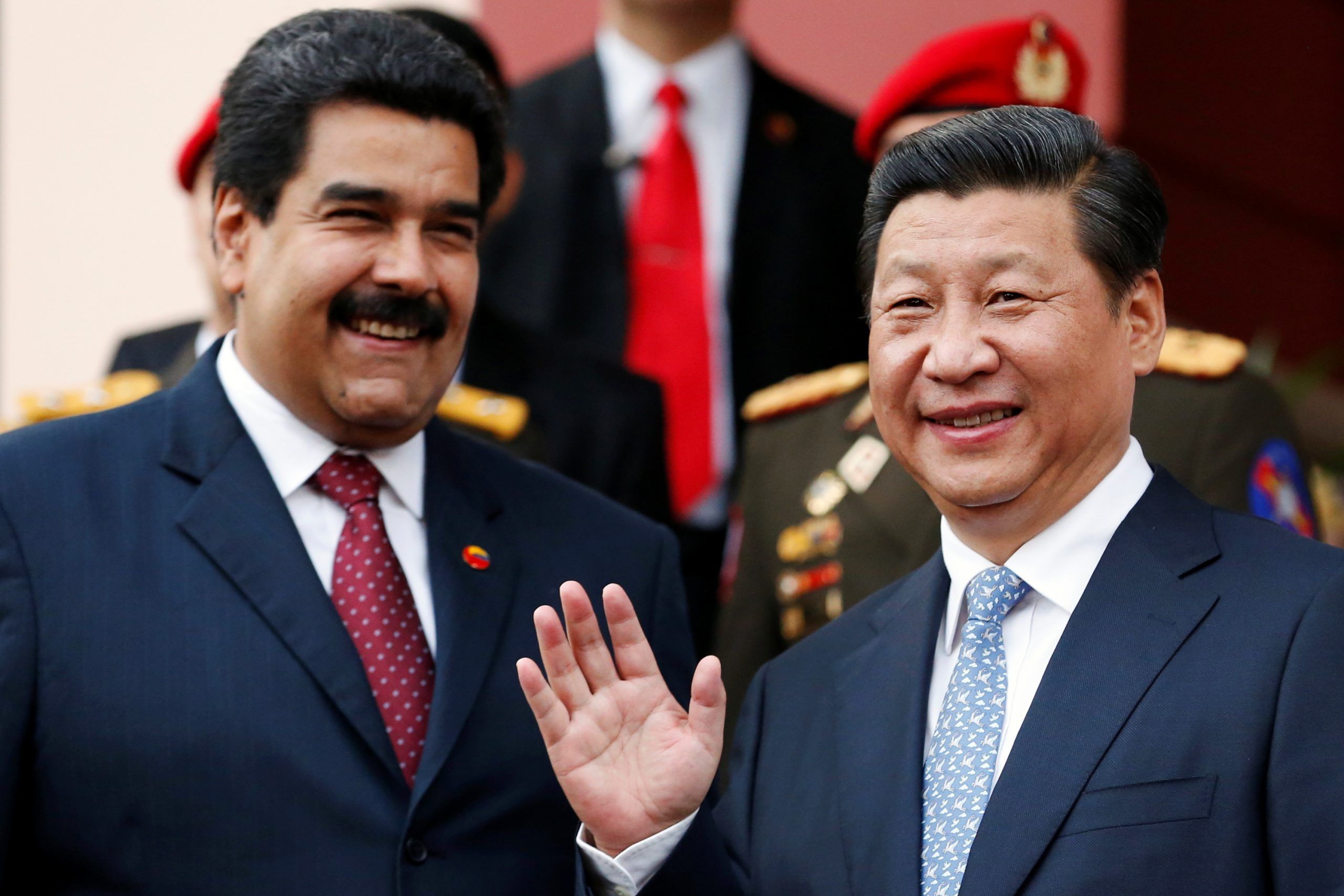 FILE PHOTO: China's President Xi Jinping (R) attends a meeting with Venezuela's President Nicolas Maduro at Miraflores Palace in Caracas.   