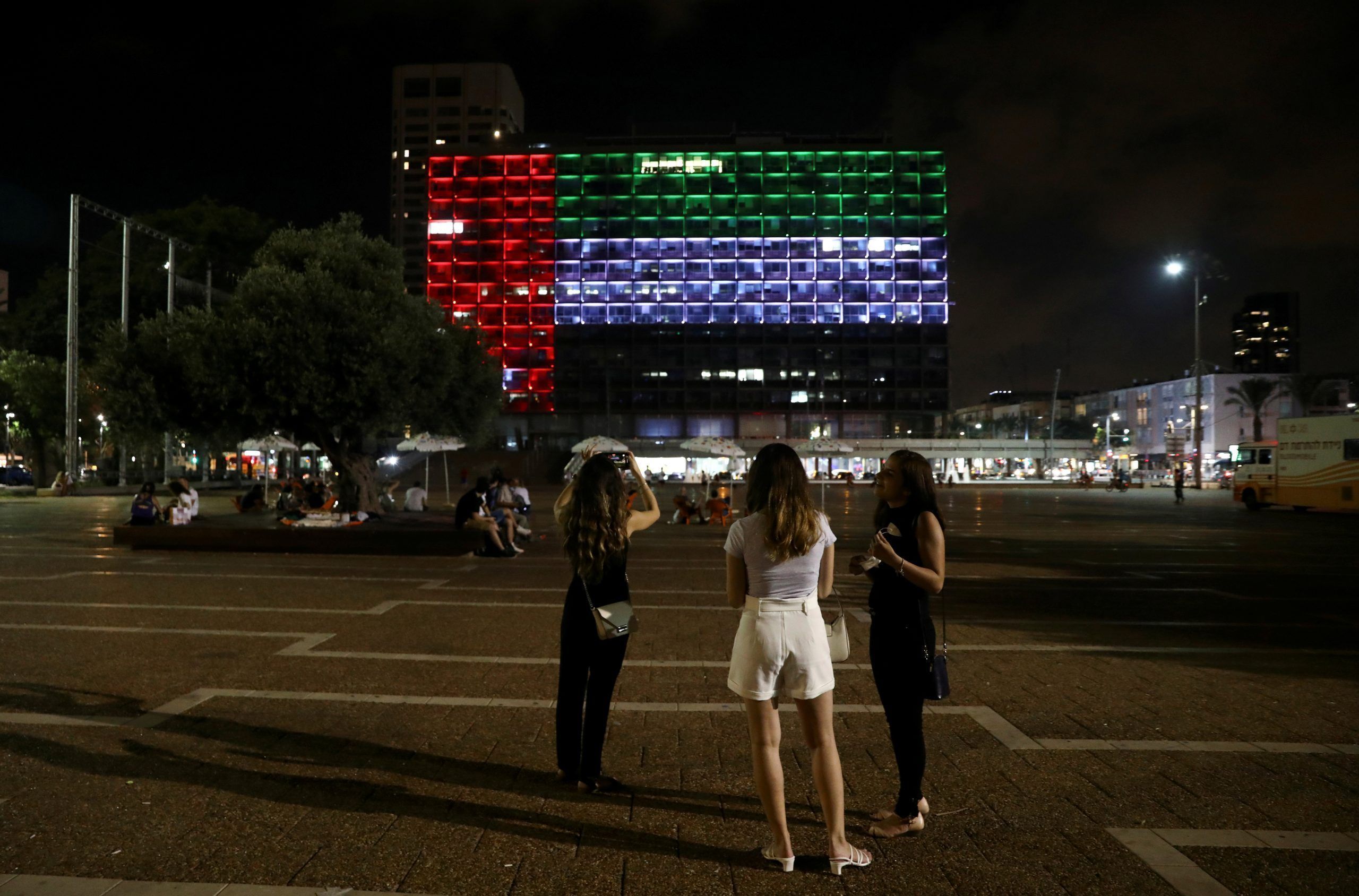 FILE PHOTO: The municipality building is lit in the United Arab Emirates national flag following the announcement of a deal to normalise relations between Israel and the United Arab Emirates, in Tel Aviv, Israel August 13, 2020.