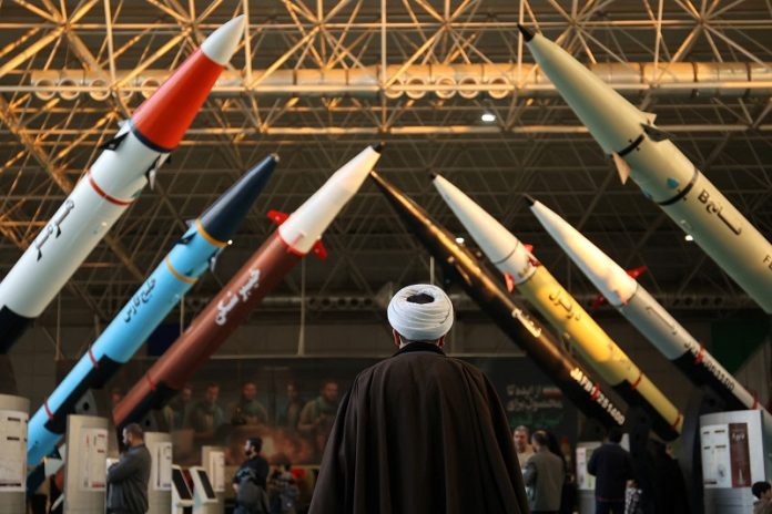 An Iranian cleric visits the Islamic Revolutionary Guard Corps (IRGC) Aerospace Force Museum in Tehran