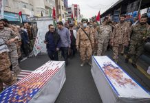 UK Sanctions Iranian Banker for Supporting Iran’s Guards