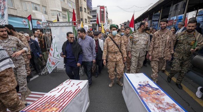 UK Sanctions Iranian Banker for Supporting Iran’s Guards