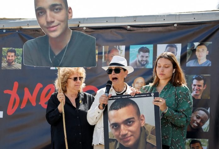 Families and supporters of hostages who were kidnapped during the October 7 attack use giant loudspeakers to call their captive loved ones over the border between Israel and Gaza