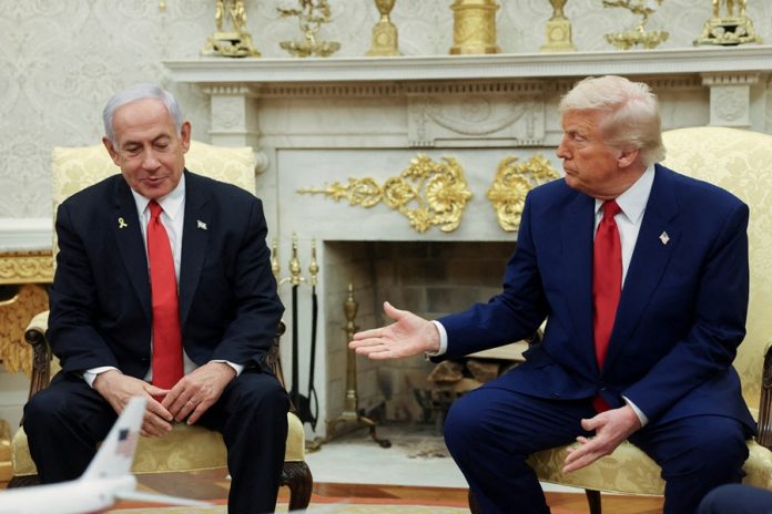 FILE PHOTO: U.S. President Trump meets Israeli PM Netanyahu in Washington