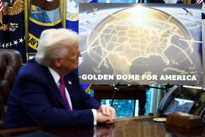 U.S. President Donald Trump and U.S. Defense Secretary Pete Hegseth make an announcement at the White House in Washington