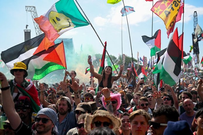 Kneecap performs at Glastonbury Festival