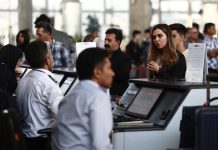Iran’s Airport Workers Face Layoffs, Unpaid Wages Amid Economic Collapse