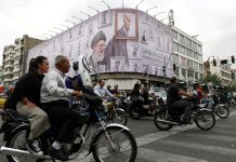 Iran Propaganda Push Seeks To Project Unity Despite Internal Divisions