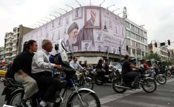 Iran Propaganda Push Seeks To Project Unity Despite Internal Divisions