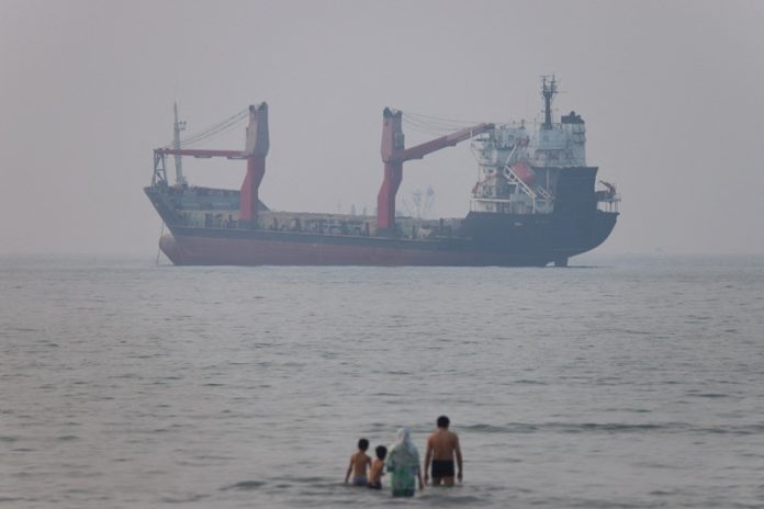 Vessels in the Strait of Hormuz near the beach of Bandar Abbas