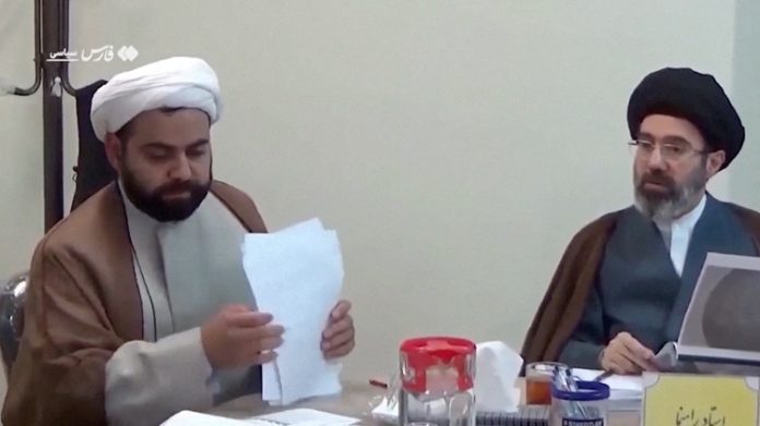 Undated archive footage released by Iranian media shows Mojtaba Khamenei attending a meeting before he assumed the role of Iran's Supreme Leader