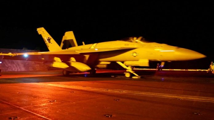 A screengrab from a video shows a military aircraft ready to take off