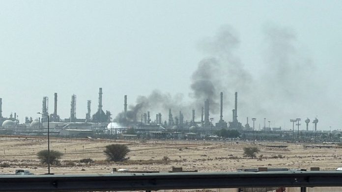 Smoke rises from a fire at the Aramco refinery south of Riyadh